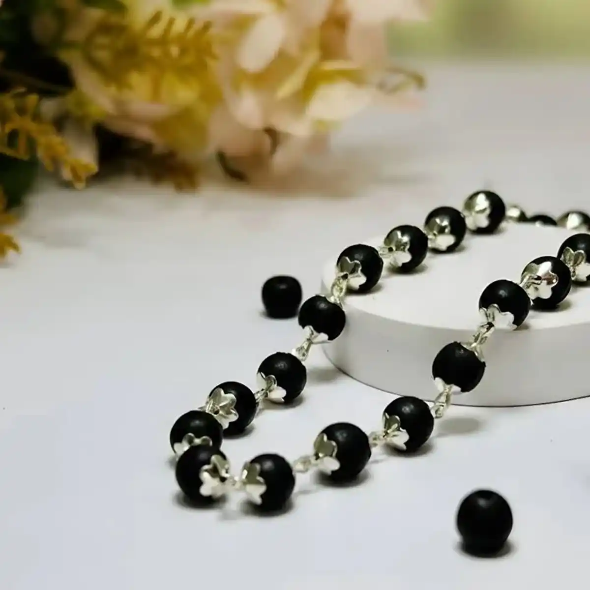 Silver Capped Karungali Mala By Rratnanidhii